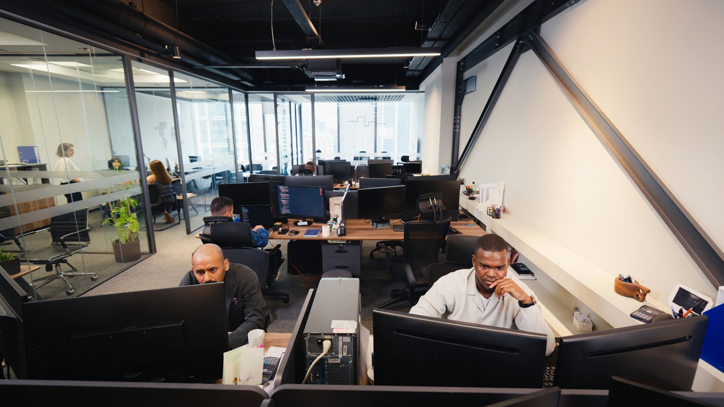 Professionals collaborating in a modern enterprise office