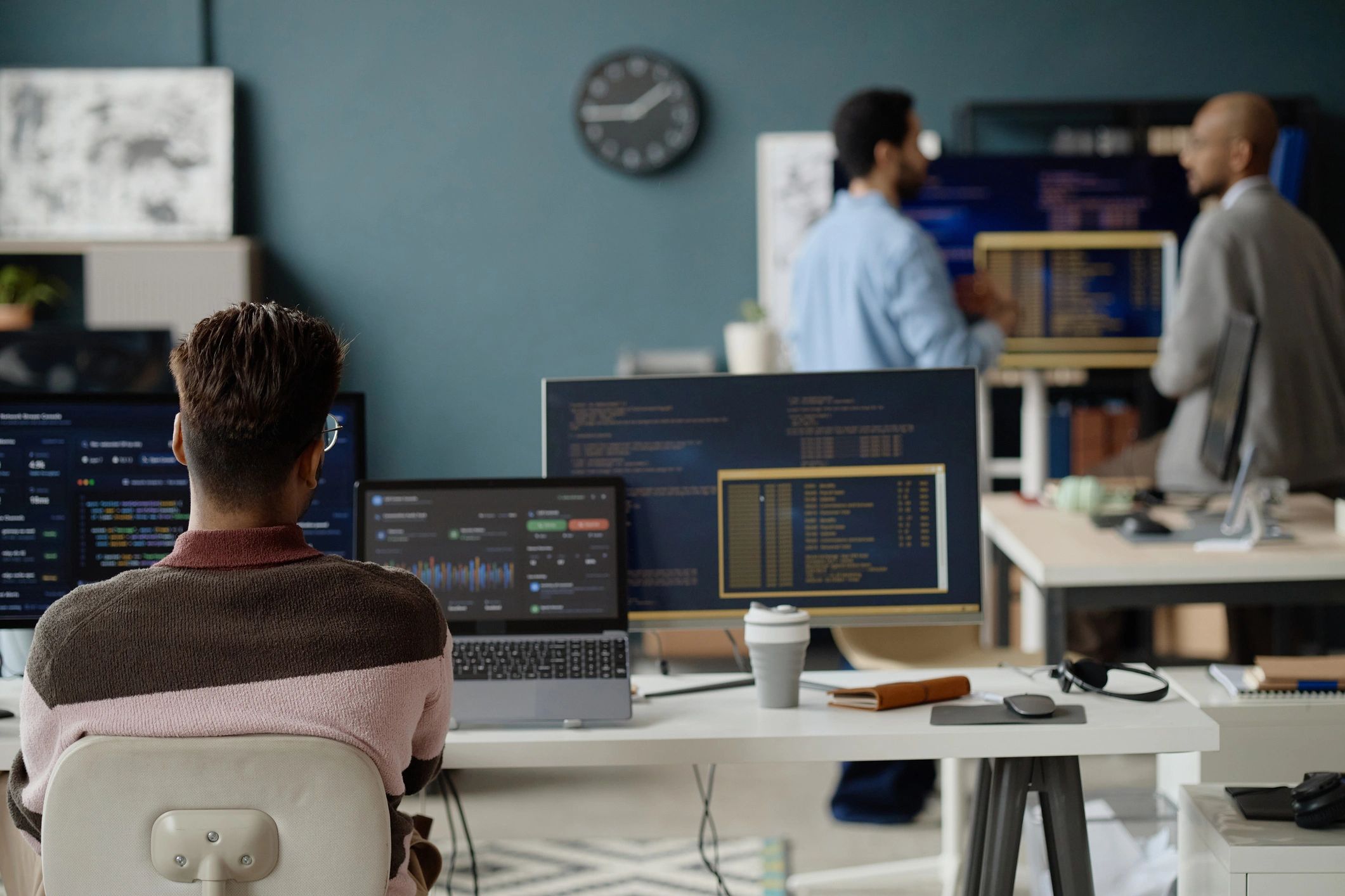 Technology professional coding in an information technology office